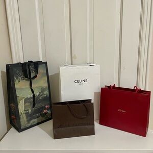 Gucci, Cartier and Celine shopping bags